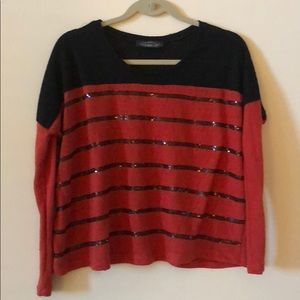 Orange and black sweater